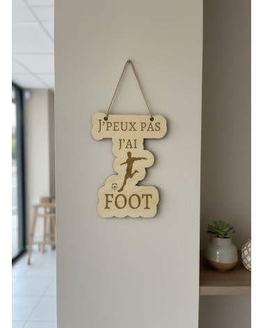Pancarte murale en bois gravée foot
